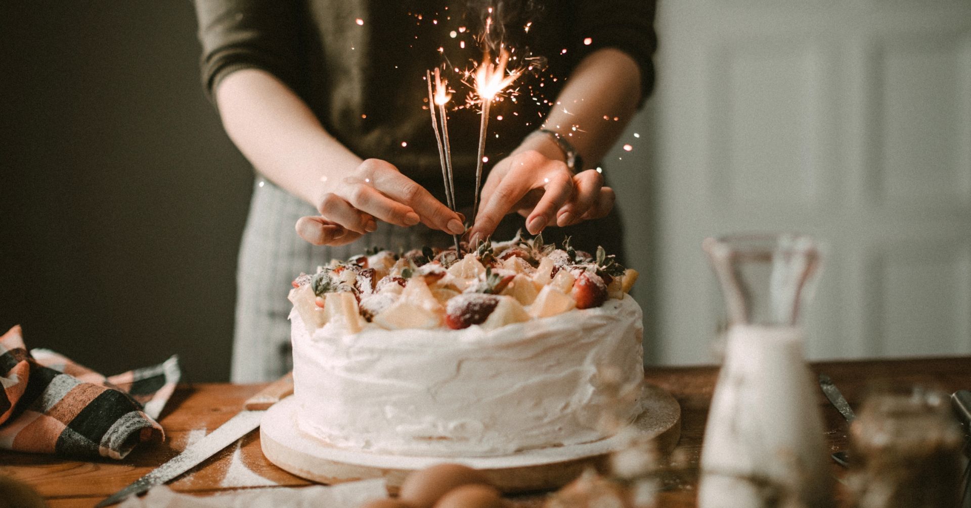 Woman making cake for celebration