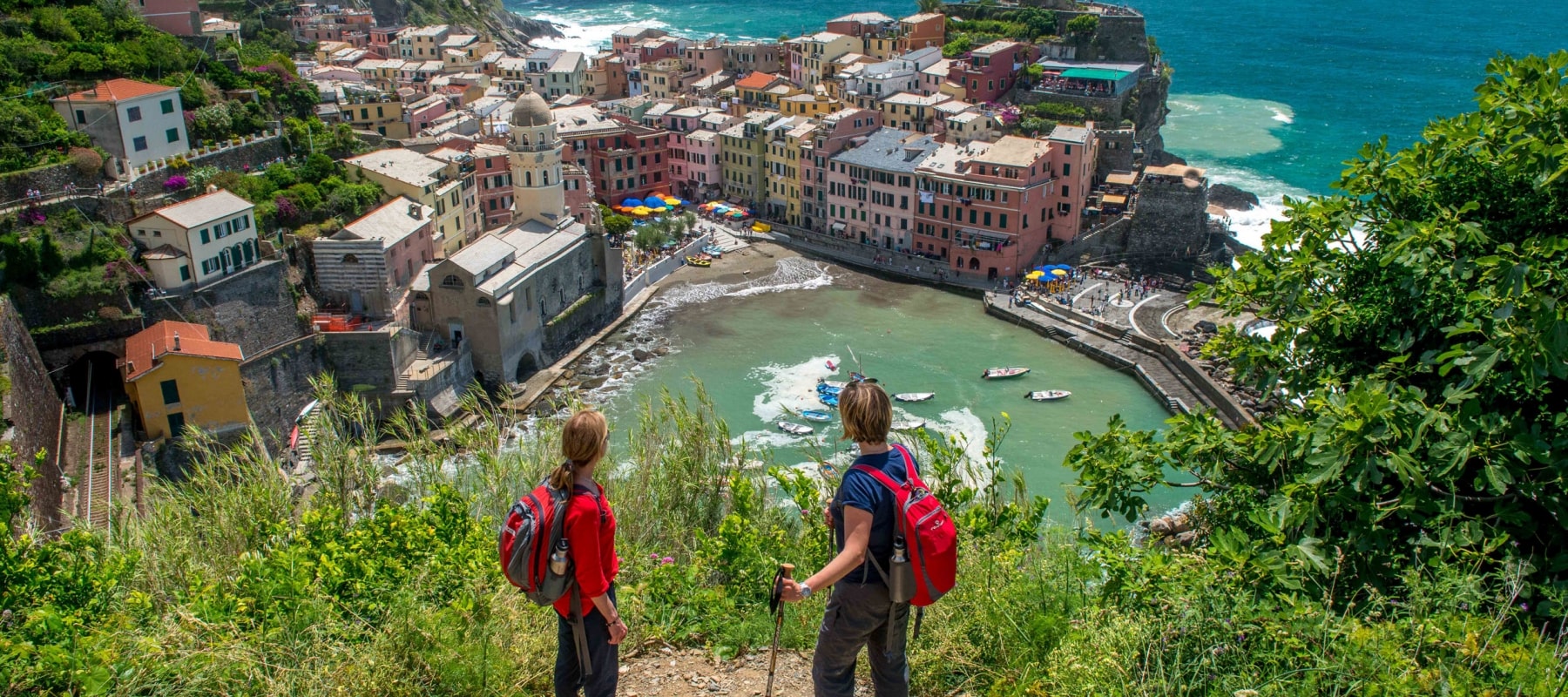 Hikers looking at beautiful European town