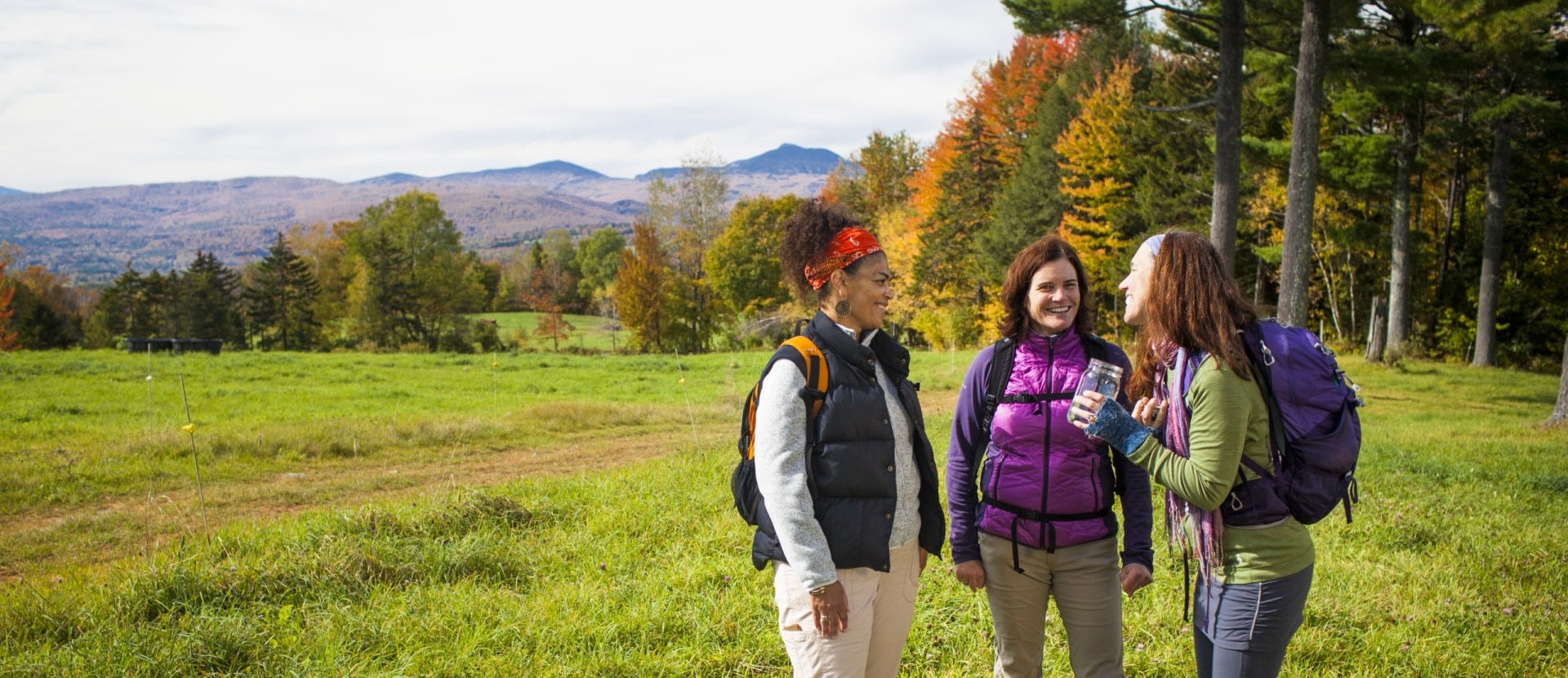 Women talking while hiking